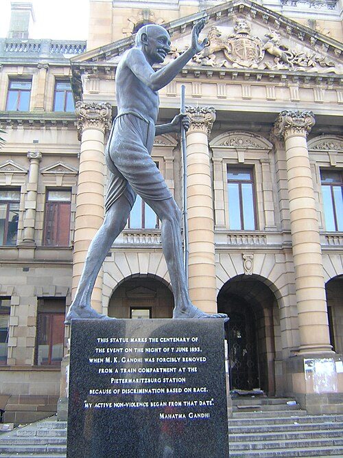 Bronze statue of Gandhi commemorating the centenary of the incident at the Pietermaritzburg Railway Station, unveiled by Archbishop Desmond Tutu on Church Street, Pietermaritzburg, in June 1993
