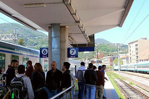 Personnel control the intense flow of tourists on the platforms of the La Spezia Centrale railway station during the public holiday of May Day